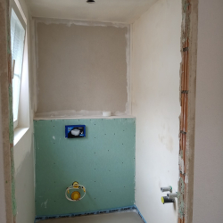 Beplankung und Grundputz WC